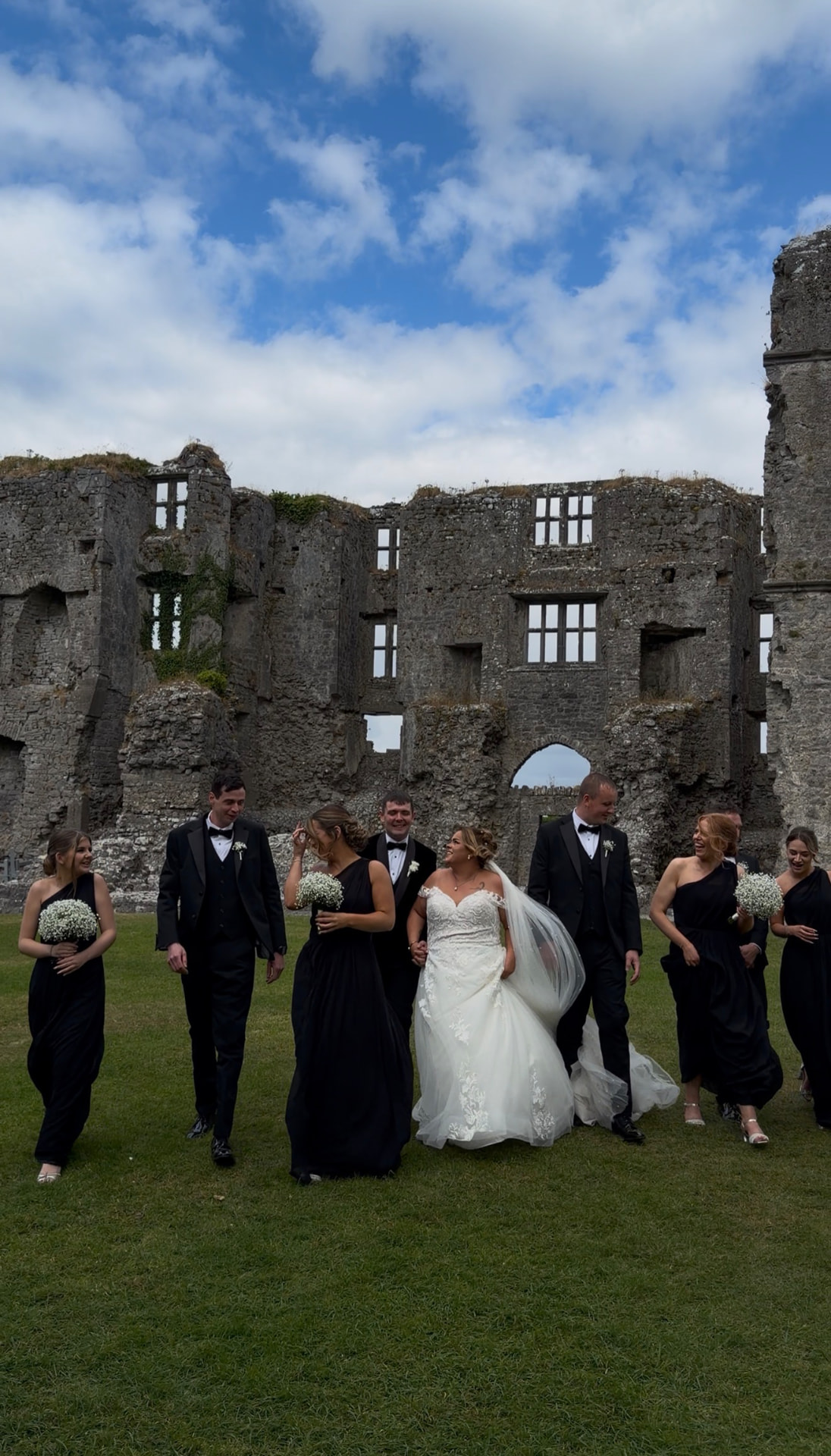 Teaghan and Tony with their full bridal party at the abbey ruins