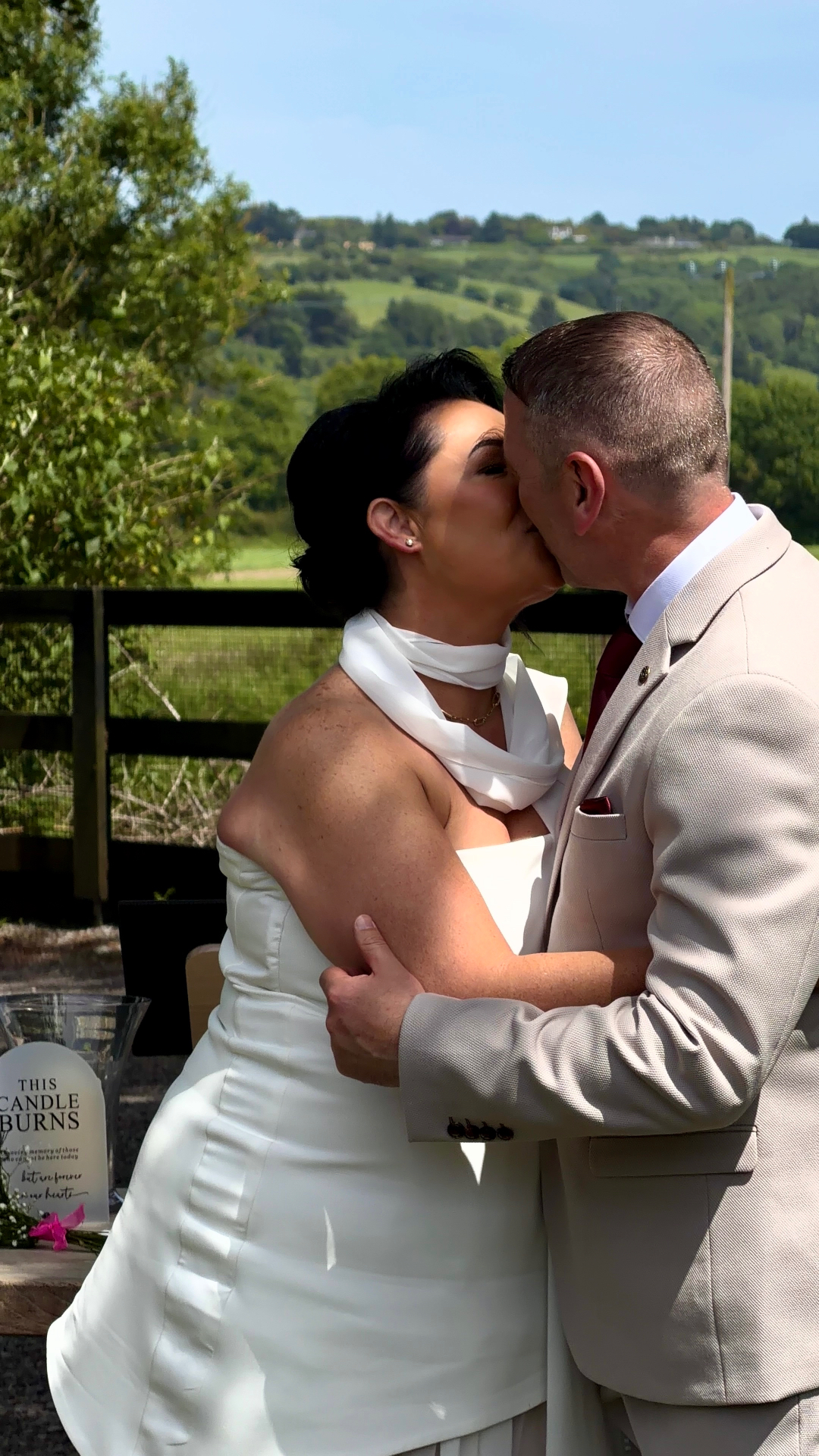 Yvonne and Trevor sharing a first kiss under Cork hills
