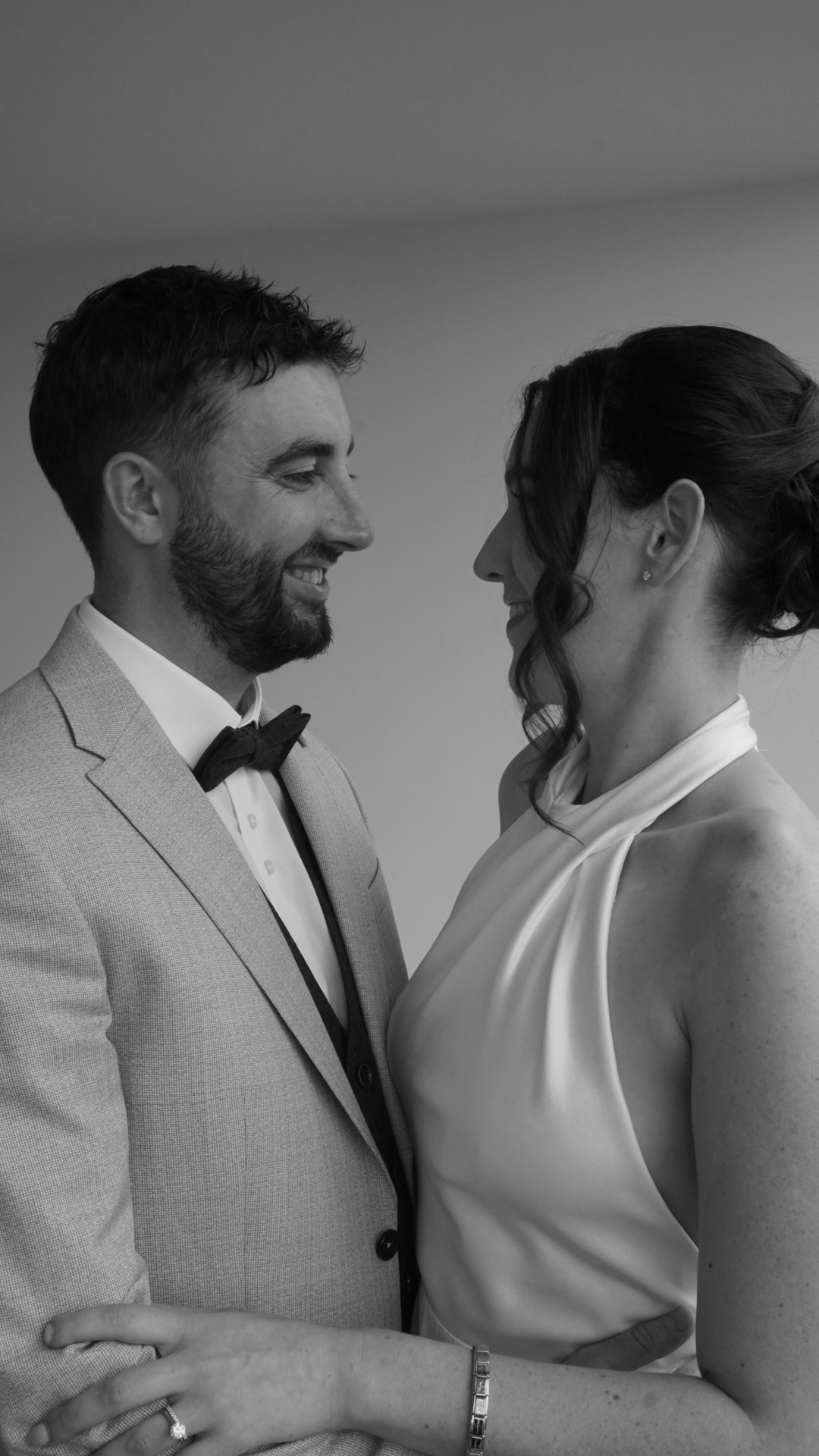Orla and Steve smiling together in black and white