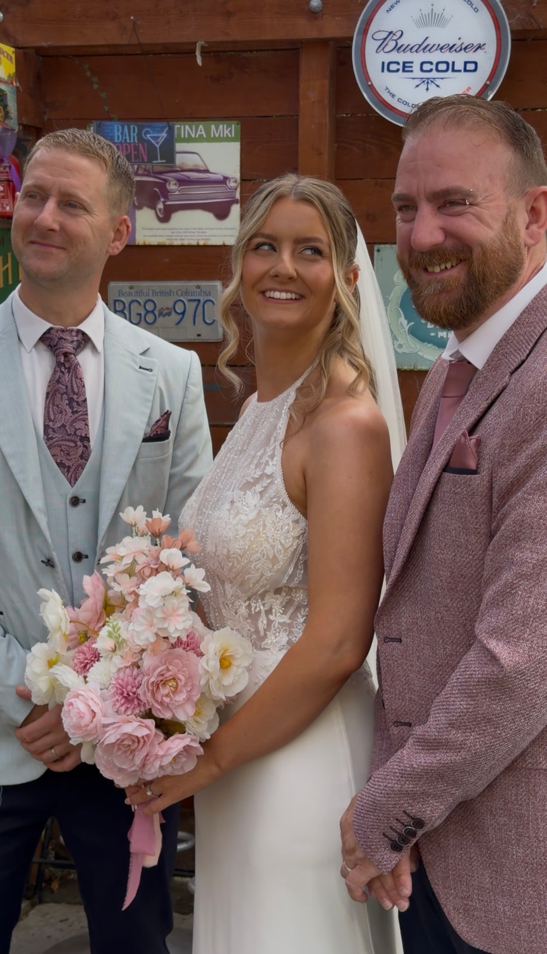 Niamh laughing with two guests outside the bar